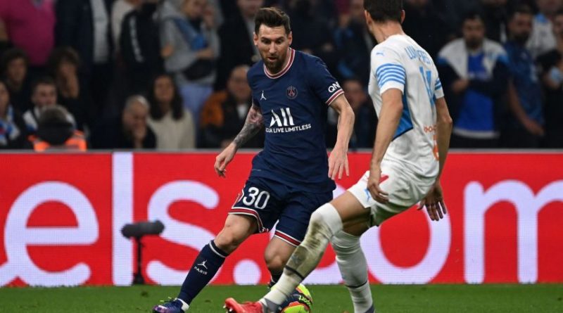 Lionel Messi in action with Marseille's Brazilian defender Luan Peres, on Oct 24, 2021